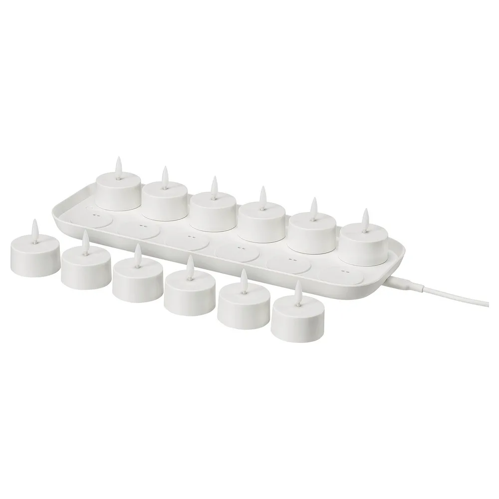 IKEA SKATGÅS (ИКЕА СКАТГОС) — Набор чайных свечей LED, с зарядной подставкой белый