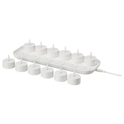 IKEA SKATGÅS (ИКЕА СКАТГОС) — Набор чайных свечей LED, с зарядной подставкой белый