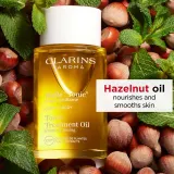 Clarins Tonic Body Treatment Oil - Масло для тела с укрепляющим эффектом, 100 мл — фото 3