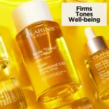 Clarins Tonic Body Treatment Oil - Масло для тела с укрепляющим эффектом, 100 мл — фото 4