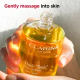 Clarins Tonic Body Treatment Oil - Масло для тела с укрепляющим эффектом, 100 мл — фото 6