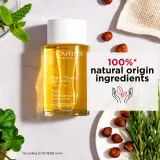 Clarins Tonic Body Treatment Oil - Масло для тела с укрепляющим эффектом, 100 мл — фото 7