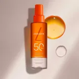 Мист солнцезащитный для тела Lancaster Sun Protective Water SPF 50 водная текстура с маслом бурити 150 мл — фото 8