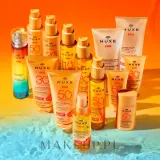 Двухфазное солнцезащитное масло для волос Nuxe Sun — фото 5