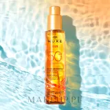Бронзирующее масло для загара Nuxe Sun SPF 50 для лица и тела — фото 4