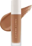 Тональный флюид Fenty Beauty Soft Lit Naturally Luminous сияющий, 32 мл, оттенок 335 — фото 1