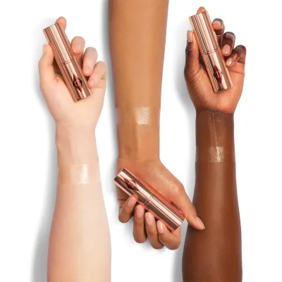 Charlotte Tilbury Unreal Highlighter Stick хайлайтер-стик для лица Glazed Goddess, 9 г